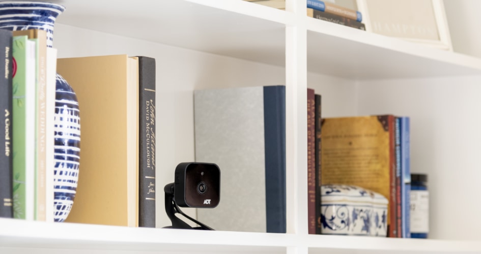 security camera on a book shelf